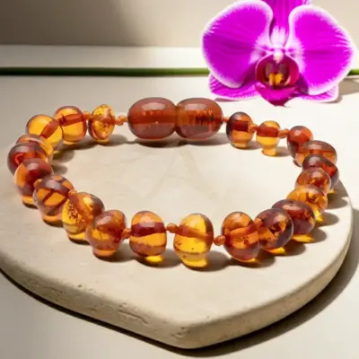 Pulseira de âmbar adulto barroco cognac polido - 19 cm